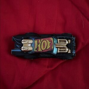 Hot Wheels Black and Gold Toy Car